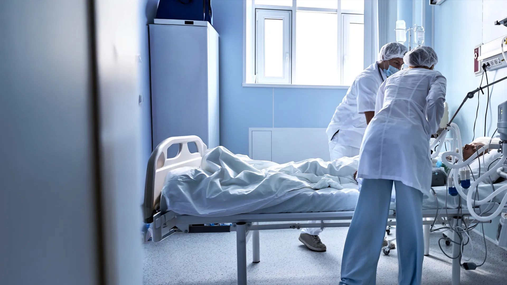 Medical staff treating a patient with sepsis